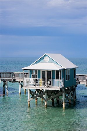 Hotel cabanas standing on stilts in the sea Stock Photo - Budget Royalty-Free & Subscription, Code: 400-04908219