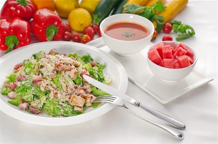 fresh classic caesar salad  served with gazpacho soup,healthy meal ,MORE DELICIOUS FOOD ON PORTFOLIO Photographie de stock - Aubaine LD & Abonnement, Code: 400-04908232