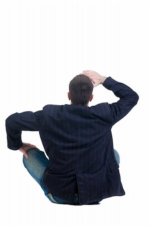 simsearch:400-05351045,k - Sitting young man looking afar. Rear view. Isolated over white. Stock Photo - Budget Royalty-Free & Subscription, Code: 400-04908307