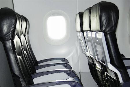 Airplane seat and window inside an aircraft Photographie de stock - Aubaine LD & Abonnement, Code: 400-04908479