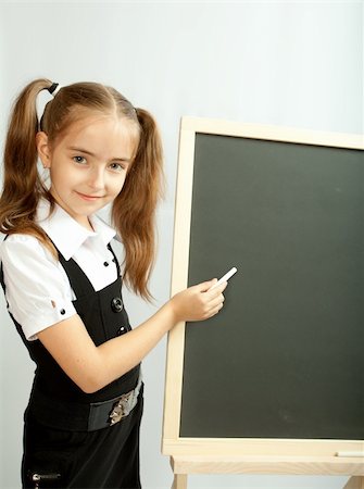 staying young - Girl and clear blackboard. Ready to write. Stock Photo - Budget Royalty-Free & Subscription, Code: 400-04908966