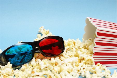 popcorn still life - A still-life theme based on the experience of 3d movie entertainment. Stock Photo - Budget Royalty-Free & Subscription, Code: 400-04909060