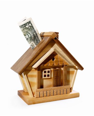 simsearch:630-06724374,k - Dollar bill being deposited into a house money box. Investment, real estate, mortgage concept Fotografie stock - Microstock e Abbonamento, Codice: 400-04909119