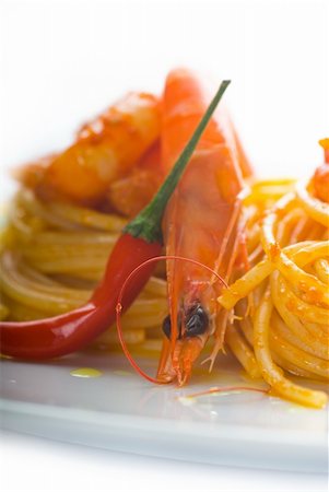 simsearch:400-04341378,k - italian spaghetti pasta and fresh spicy shrimps sauce over white Fotografie stock - Microstock e Abbonamento, Codice: 400-04909622