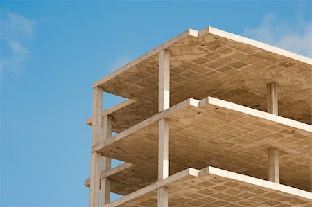 solids architecture unfinished - Unfinished concrete structure of a high rise builiding Stock Photo - Budget Royalty-Free & Subscription, Code: 400-04900116