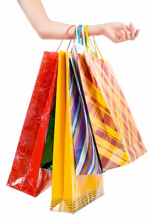sensual mannequin - Female hand holding colorful shopping bags on white Stock Photo - Budget Royalty-Free & Subscription, Code: 400-04900125