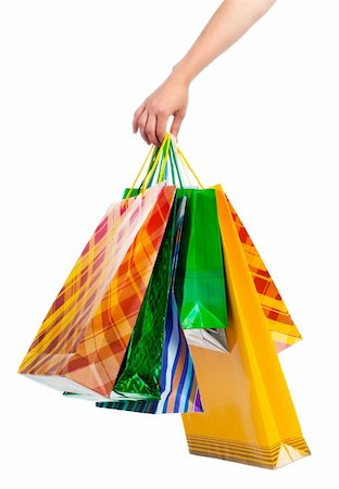 sensual mannequin - Female hand holding colorful shopping bags on white Stock Photo - Budget Royalty-Free & Subscription, Code: 400-04900127