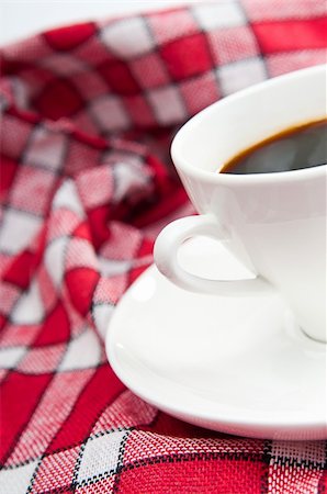 expresso bar - cup of coffee is on a white saucer Stock Photo - Budget Royalty-Free & Subscription, Code: 400-04900121