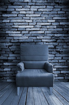 old single sofa seat in front of the wall Foto de stock - Super Valor sin royalties y Suscripción, Código: 400-04900566