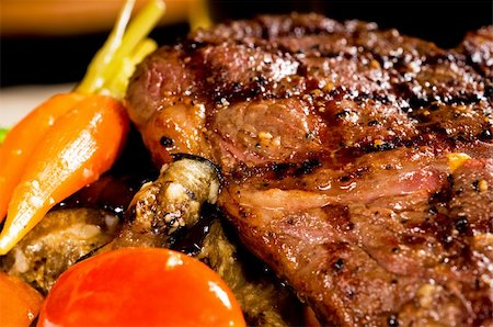 fresh grilled ribeye steak with broccoli,carrot and cherry tomatoes on side Stock Photo - Budget Royalty-Free & Subscription, Code: 400-04901039