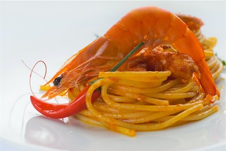 simsearch:400-04341378,k - italian spaghetti pasta and fresh spicy shrimps sauce over white Fotografie stock - Microstock e Abbonamento, Codice: 400-04901047