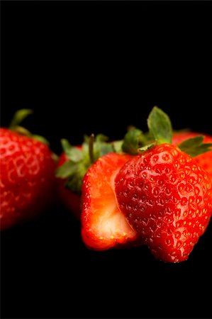 simsearch:400-03920561,k - fresh vivid colored strawberry over black background Photographie de stock - Aubaine LD & Abonnement, Code: 400-04901050