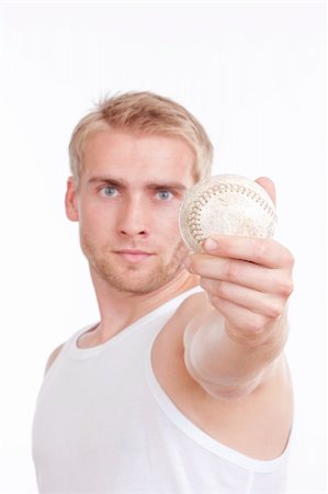 man holding out a baseball in his hand - short depth of field - isolated on white Stock Photo - Budget Royalty-Free & Subscription, Code: 400-04901457