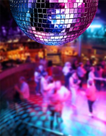Dancing under disco mirror ball color lights Stock Photo - Budget Royalty-Free & Subscription, Code: 400-04901582