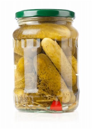 pickling gherkin - pickles in a glass jar is isolated on a white background Stock Photo - Budget Royalty-Free & Subscription, Code: 400-04901750