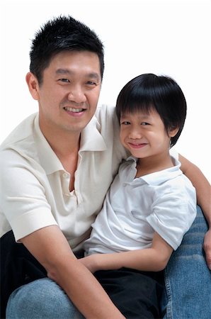 simsearch:400-07517983,k - Father and son on white background Foto de stock - Super Valor sin royalties y Suscripción, Código: 400-04901832