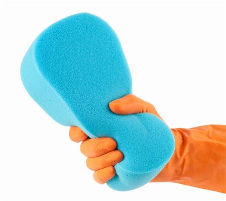 rubber hand gloves - Hand in orange glove with sponge isolated on white background Stock Photo - Budget Royalty-Free & Subscription, Code: 400-04901876