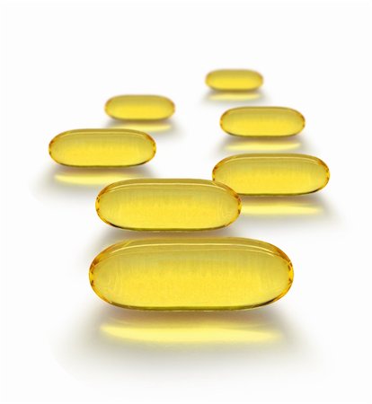 Seven day cure  yellow transparent medicine capsules Stock Photo - Budget Royalty-Free & Subscription, Code: 400-04902328