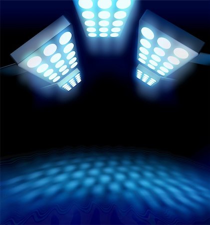 stage floodlight - Stadium style premiere lights illuminating blue surface on dark background Stock Photo - Budget Royalty-Free & Subscription, Code: 400-04902343