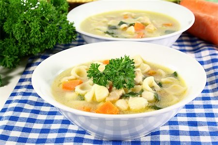 silencefoto (artist) - a cup of chicken soup with fresh vegetables Stockbilder - Microstock & Abonnement, Bildnummer: 400-04902495