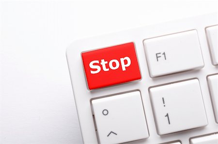 stop key on keyboard in red showing halt concept Stock Photo - Budget Royalty-Free & Subscription, Code: 400-04902627