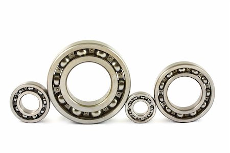 simsearch:400-06891668,k - Four steel ball bearings isolated on a white background Fotografie stock - Microstock e Abbonamento, Codice: 400-04902989