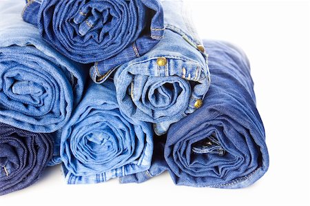 simsearch:400-04473469,k - Rolls of Blue Jeans isolated on white background with copy space for your text Stock Photo - Budget Royalty-Free & Subscription, Code: 400-04903165