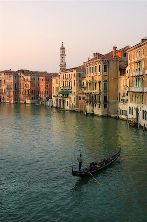 simsearch:400-04558229,k - Vertical oriented image of gondola sailing on Gand Canal along old multicolored houses in Venice, Italy. Photographie de stock - Aubaine LD & Abonnement, Code: 400-04903407