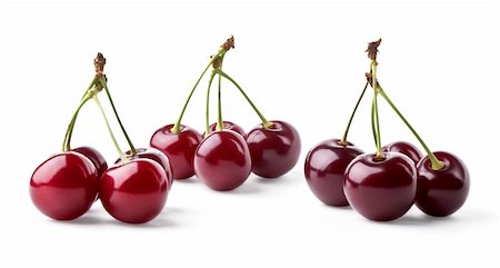 simsearch:400-06921455,k - Three groups of juicy cherries isolated on white background Foto de stock - Super Valor sin royalties y Suscripción, Código: 400-04914558