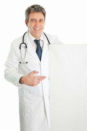 simsearch:400-05745246,k - Smiling senior medical doctor presenting empty board. Isolated on white Photographie de stock - Aubaine LD & Abonnement, Code: 400-04915406