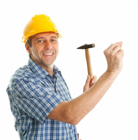 simsearch:400-08054637,k - Confident worker wearing hard hat and hammering in. Isolated on white Stock Photo - Budget Royalty-Free & Subscription, Code: 400-04915429