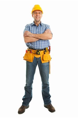 Confident worker wearing hard hat and toolbelt. Isolated on white Fotografie stock - Microstock e Abbonamento, Codice: 400-04915434