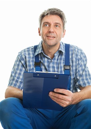 Confident service man taking notes. Isolated on white Stock Photo - Budget Royalty-Free & Subscription, Code: 400-04915450