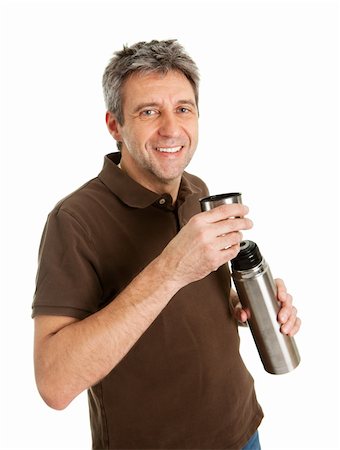 Portrait of senior man drinking coffee/tea from thermos. Isolated on white Stock Photo - Budget Royalty-Free & Subscription, Code: 400-04915464