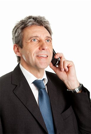 Senior business man talking on cellphone. Isolated on white Stock Photo - Budget Royalty-Free & Subscription, Code: 400-04915477
