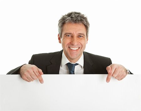 person holding up sign - Confident businessmen presenting empty board. Isolated on white Stock Photo - Budget Royalty-Free & Subscription, Code: 400-04915497