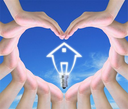 simsearch:400-04900554,k - light bulb model of a house in women hands making a symbol of love Photographie de stock - Aubaine LD & Abonnement, Code: 400-04916397