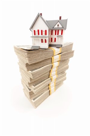 simsearch:400-06770104,k - Small House on Stacks of Hundred Dollar Bills Isolated on a White Background. Foto de stock - Super Valor sin royalties y Suscripción, Código: 400-04916707