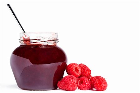 raspberry jelly - raspberry jam jar with a spoon and raspberries aside on white background Foto de stock - Super Valor sin royalties y Suscripción, Código: 400-04916931