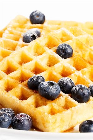 photos of blueberries for kitchen - waffles with sugar covered blueberries and syrup on white background Stock Photo - Budget Royalty-Free & Subscription, Code: 400-04916961