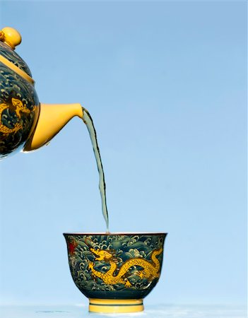 sky tea - Pouring a  cup of chinese tea on a bright summer day Stock Photo - Budget Royalty-Free & Subscription, Code: 400-04917949