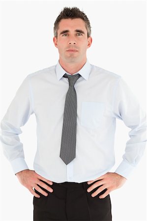 simsearch:400-04150475,k - Portrait of a manager posing against a white background Foto de stock - Super Valor sin royalties y Suscripción, Código: 400-04918047