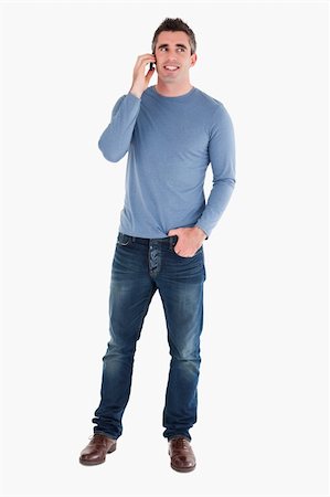 smart models male - Happy man answering the phone against a white background Stock Photo - Budget Royalty-Free & Subscription, Code: 400-04918278