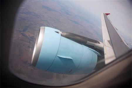 simsearch:400-06084560,k - Airplane engine seen through cabinn window Stock Photo - Budget Royalty-Free & Subscription, Code: 400-04918302