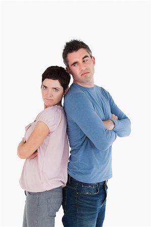 simsearch:400-06172922,k - Couple angry at each other standing back to back Stock Photo - Budget Royalty-Free & Subscription, Code: 400-04918325