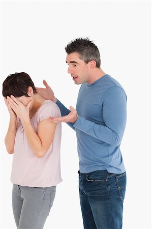 simsearch:400-06172922,k - Woman crying while her husband is trying to explain himself against a white background Stock Photo - Budget Royalty-Free & Subscription, Code: 400-04918334
