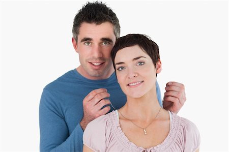 simsearch:400-05294518,k - Husband offering a necklace to his wife against a white background Fotografie stock - Microstock e Abbonamento, Codice: 400-04918362