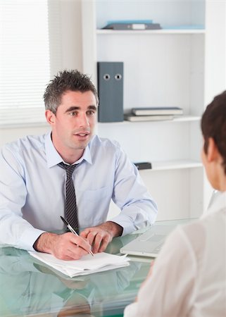 Portrait of a manager interviewing an applicant in his office Stock Photo - Budget Royalty-Free & Subscription, Code: 400-04918404