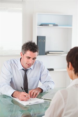 Portrait of a manager interviewing a female applicant in his office Stock Photo - Budget Royalty-Free & Subscription, Code: 400-04918405
