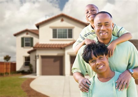 family house three people outdoors play - Attractive African American Family in Front of Beautiful House. Stock Photo - Budget Royalty-Free & Subscription, Code: 400-04919838